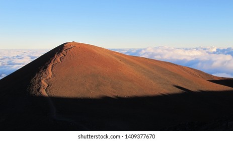 Red Mountaintop Trail Above The Clouds