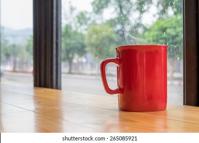 Red Mug Coffee On Wood Table