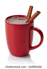 Red Mug Of Hot Chocolate Drink With Cinnamon Sticks Isolated On White Background