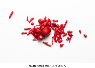 Red natural coral beads. Mineralogy collection part. Isolated on white - Shutterstock ID 2175662179