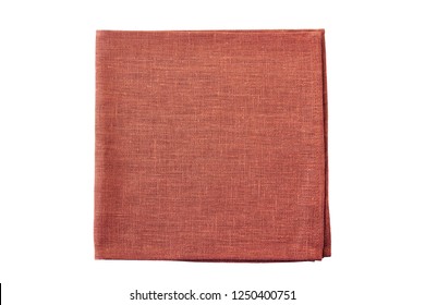 Red natural folded textile napkin on white