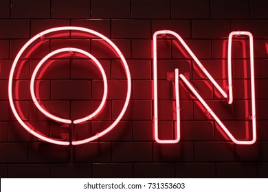 Red Neon Capital Letters Writing (on) With Black Background