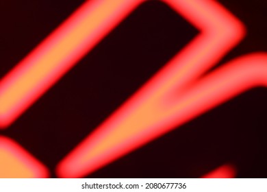 red neon color blurry letter image - Shutterstock ID 2080677736