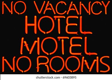 Red neon sign for accommodation.