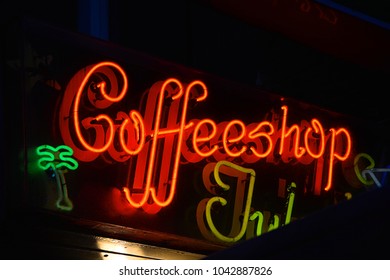 A Red Neon Sign Of A Coffeeshop (coffee Shop) - Selling Cannabis (marijuana) In Amsterdam, Holland