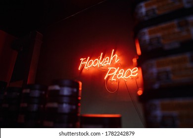 
Red Neon Sign In Hookah Bar