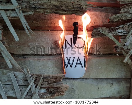 Red No War message and peace symbol graffiti on grunge ciment wall - peace concept