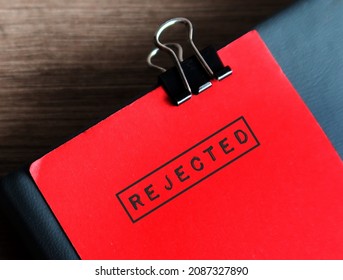 Red note clip with document with text stamp REJECTED, concept of to refuse to accept or use the idea or work, not given approval or acceptance to plan, application or project - Shutterstock ID 2087327890