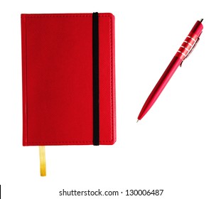 Red Notebook With Pen Isolated On White