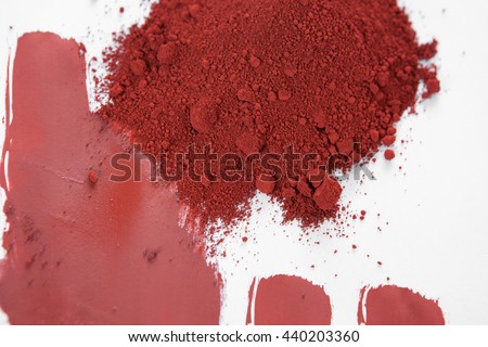 Red ochre, also spelled ocher, a natural earth pigment based on hydrated iron oxide.