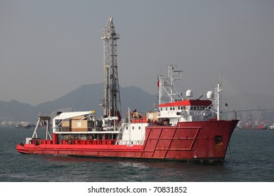 Red Oil Drilling Ship In Harbor