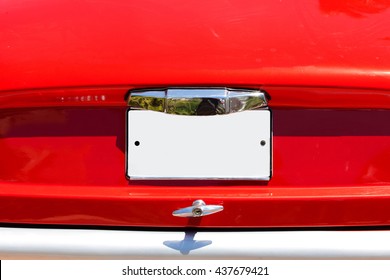 Red Old Car With Empty License Plate