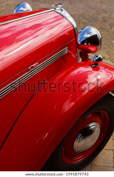 red old car in sunny\
day