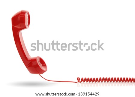 Red old fashioned telephone receiver isolated on a white
