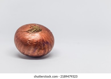 Red Onion Isolated On White Background. Fresh Root Vegetables.