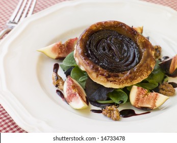 Red Onion Tarte Tatin With Walnuts Figs And Red Wine Syrup