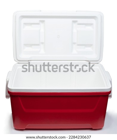 Red open plastic thermo fridge front view isolated