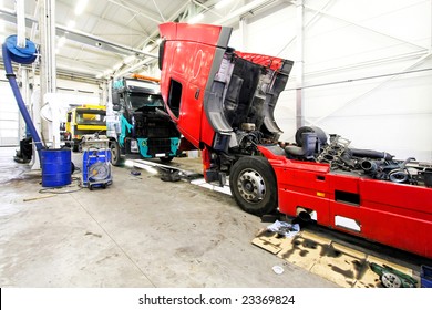 Red Open Truck In Big Service Garage