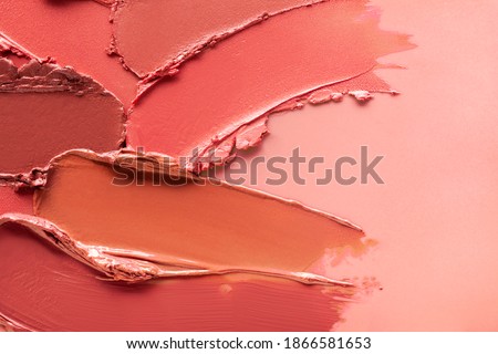 Red orange brown lipstick background texture smudged
