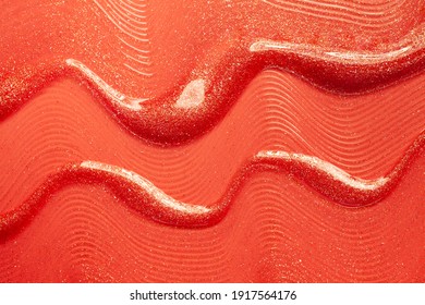 Red Orange Lip Gloss With Shimmer Textured Background