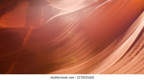 Red orange shades sandstone rock background texture. Upper Antelope Canyon, slot canyon in Arizona. 