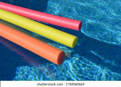 Red Orange Yellow Pool Noodles Floating Stock Photo 1769060669 ...