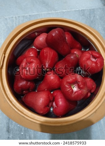 Red organic fruit bowl photo 