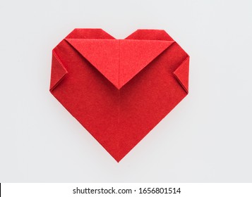 Red Origami Heart On White Background.