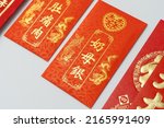 Red packet (Angpow) for Chinese pre-wedding gift ceremony (Guo Da Li), Chinese betrothal ceremony isolated on white background. Red packet Chinese font translation “Parental Gift”