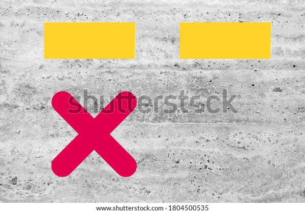Red paint cross marks on the cement floor with a
yellow dividing line