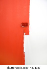 Red Paint Roller By Wall