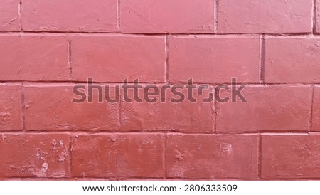 Red Painted Brick Wall Texture Background with Rustic Masonry Pattern and Weathered Surface