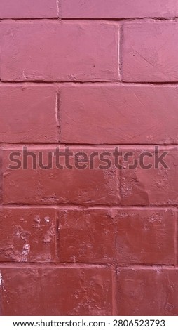 Red Painted Brick Wall Texture Background with Weathered Masonry Pattern and Rustic Construction Surface