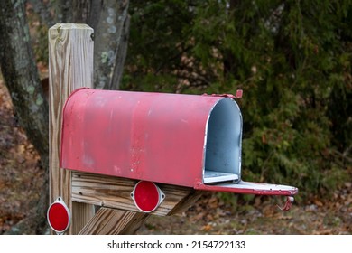 red painted Open suburb street  side mailbox 