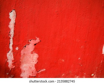 Red Painted Wall Peeling Away