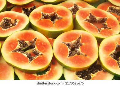 Red Papaya Fruits Slices Background