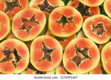 Red Papaya Slices As Background