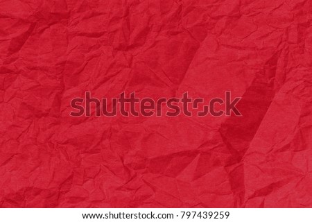 Red paper backround. Red crumpled paper texture. Red crumpled paper texture. Red wrapping paper as Christmas background 