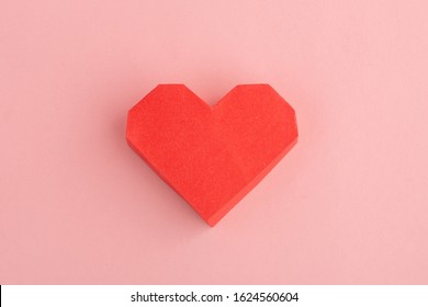 Red Paper Heart On Pink Background, Top View. Lovely 3D Card For St. Valentine's Day.