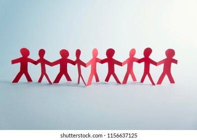 Red paper people standing together - Powered by Shutterstock