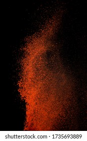 Red Paprika Spices Powder Explosion, Flying Chili Pepper Isolated On Black Background. Splash Of Spice Background. 