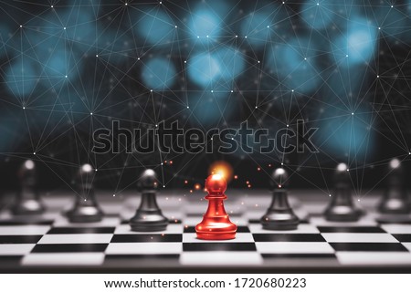 Red pawn chess stepped out of line to leading black chess and show different thinking ideas. Business technology change and disruption for new normal concept.
