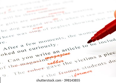 Red Pen Marked On Wrong Spelling And Write Correct Word Above