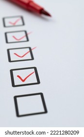 Red Pen Marking On Checklist Sheet