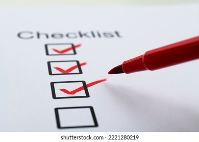 Red Pen Marking On Checklist Sheet