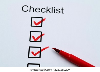 Red Pen Marking On Checklist Sheet