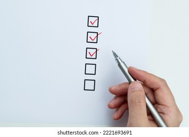 Red Pen Marking On Checklist Sheet