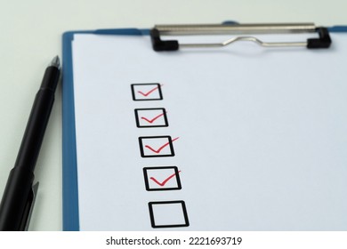 Red Pen Marking On Checklist Sheet