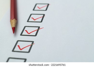 Red Pen Marking On Checklist Sheet