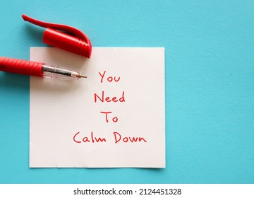Red Pen Writing Message YOU NEED TO CALM DOWN - Self-reminder To Stop Workplace Drama, Avoid Conflicts And Reduce Toxicity In Office Environment